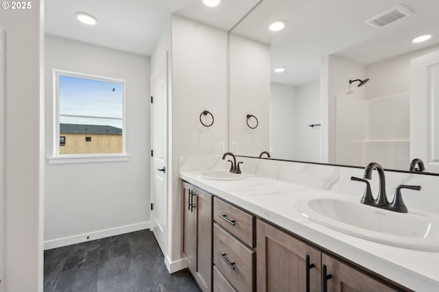 4321 N 11th Way, Ridgefield, WA 98642 - full bath featuring baseboards, double vanity, a shower, and recessed lighting