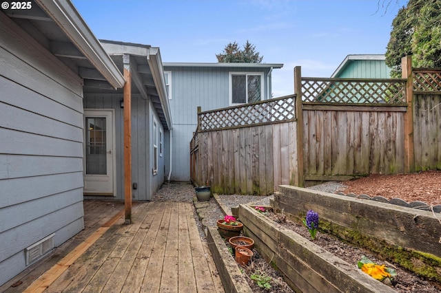 6125 S Hood Ave, Portland, OR 97239 - view of patio featuring a deck, fence, and visible vents
