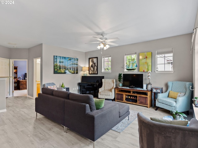 1170 NE 64th Ln Unit 1209, Hillsboro, OR 97124 - living area featuring light wood-style floors, plenty of natural light, and ceiling fan