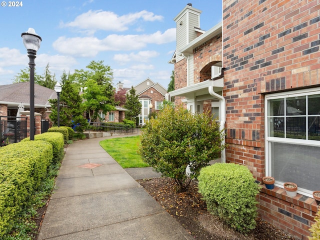 view of property's community with fence