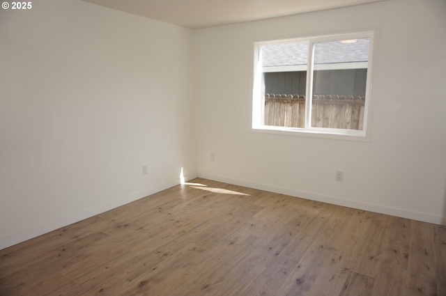 7012 NE 149th Ct, Vancouver, WA 98682 - unfurnished room with baseboards and wood finished floors