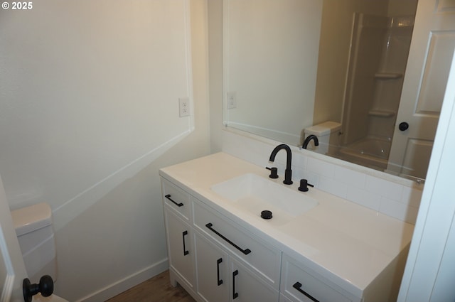 7012 NE 149th Ct, Vancouver, WA 98682 - bathroom featuring vanity, toilet, tub / shower combination, and baseboards