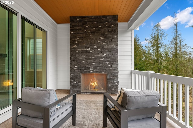 balcony with a large fireplace