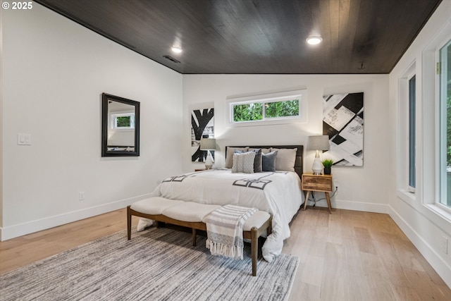 17253 SW Rivendell Dr, Portland, OR 97224 - bedroom with light wood-style flooring, wood ceiling, vaulted ceiling, and recessed lighting
