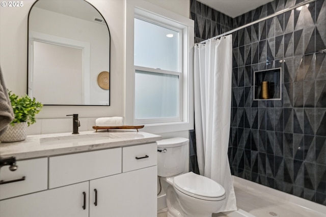 17253 SW Rivendell Dr, Portland, OR 97224 - full bathroom featuring vanity and a tile shower