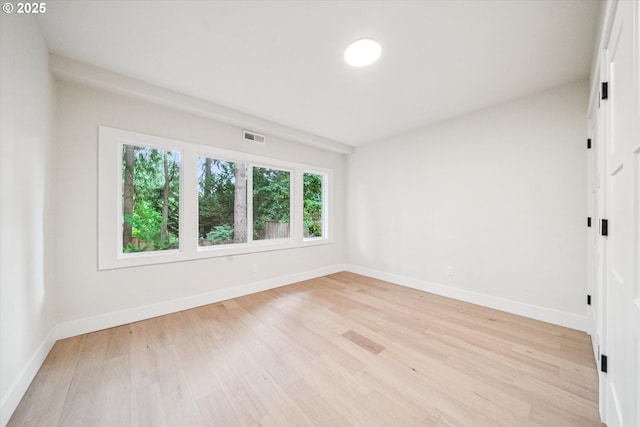 17253 SW Rivendell Dr, Portland, OR 97224 - spare room featuring light wood-style floors and baseboards