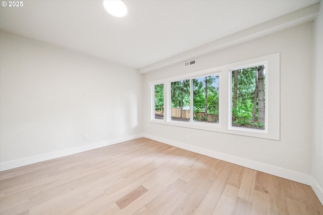 17253 SW Rivendell Dr, Portland, OR 97224 - spare room featuring light wood-type flooring and baseboards