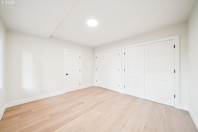 17253 SW Rivendell Dr, Portland, OR 97224 - unfurnished bedroom with multiple closets and light wood finished floors