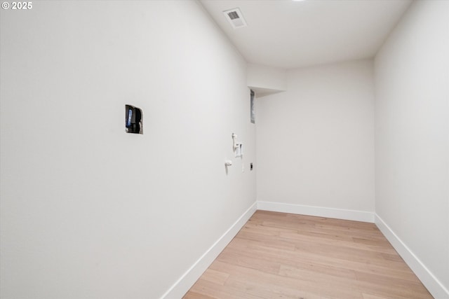 17253 SW Rivendell Dr, Portland, OR 97224 - washroom with light wood-style flooring and baseboards