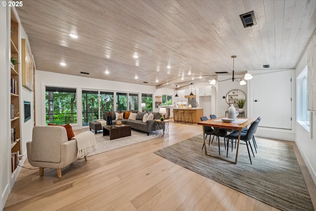 17253 SW Rivendell Dr, Portland, OR 97224 - dining space with light wood-style floors, wooden ceiling, a chandelier, and recessed lighting