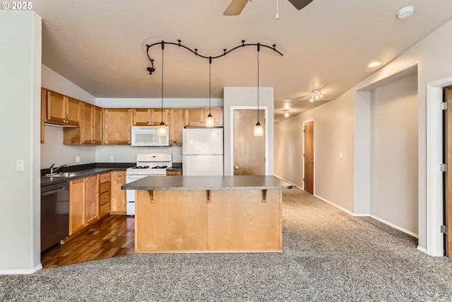 kitchen featuring a breakfast bar, a center island, white appliances, dark colored carpet, and hanging light fixtures