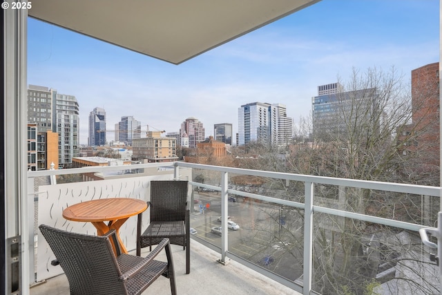 balcony featuring a view of city