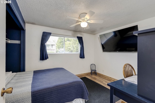 18430 SW Broad Oak Blvd, Beaverton, OR 97007 - carpeted bedroom featuring a textured ceiling and a ceiling fan
