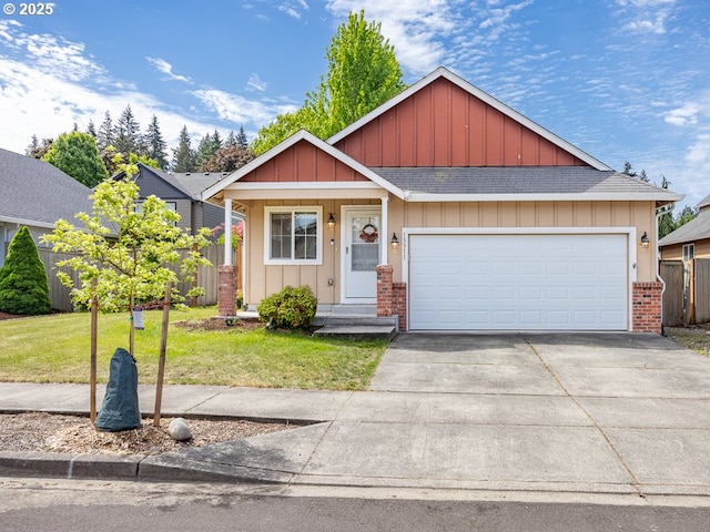 13311 NE 50th Way, Vancouver, WA 98682 - view of front of property with brick siding, concrete driveway, board and batten siding, and a garage