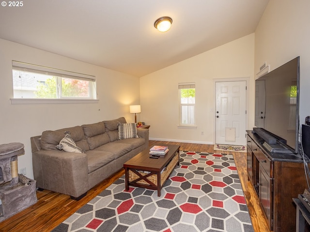 13311 NE 50th Way, Vancouver, WA 98682 - living room featuring wood finished floors, lofted ceiling, and baseboards