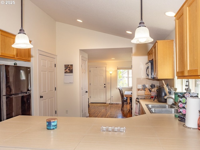 13311 NE 50th Way, Vancouver, WA 98682 - kitchen featuring freestanding refrigerator, stainless steel microwave, vaulted ceiling, dark wood-style flooring, and recessed lighting