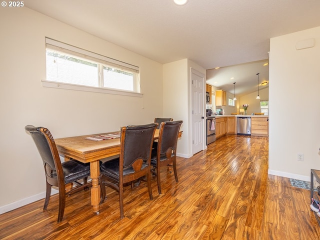 13311 NE 50th Way, Vancouver, WA 98682 - dining room with dark wood-style floors, healthy amount of natural light, and baseboards