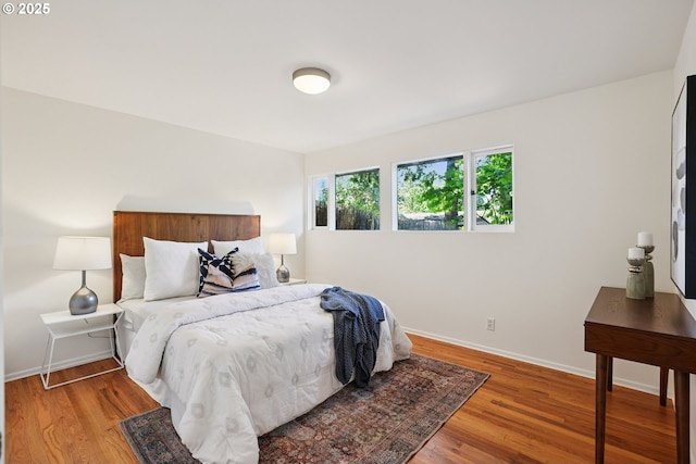 311 NE 130th Pl, Portland, OR 97230 - bedroom with light wood-type flooring and baseboards