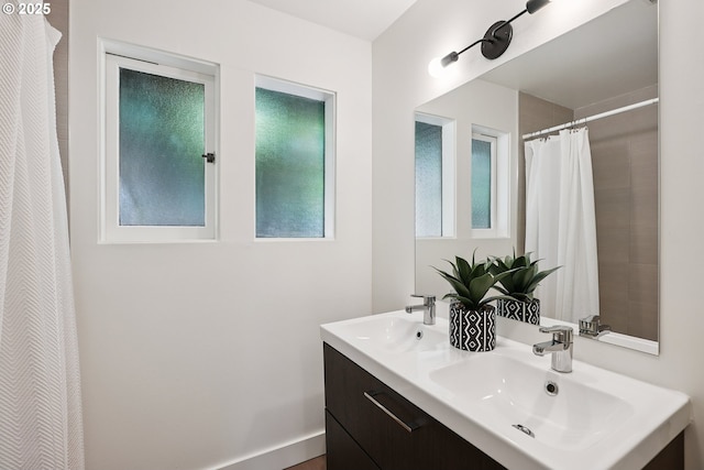 311 NE 130th Pl, Portland, OR 97230 - bathroom featuring double vanity and a shower with shower curtain
