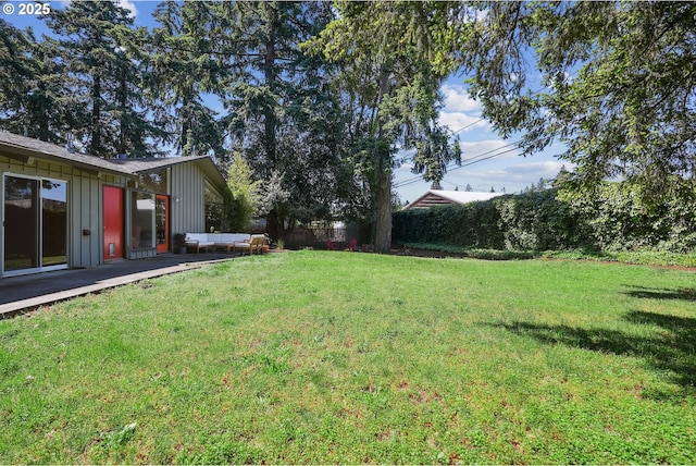 311 NE 130th Pl, Portland, OR 97230 - view of yard featuring an outdoor hangout area and a patio