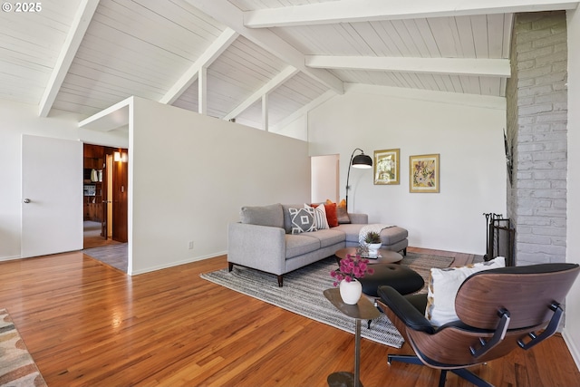 311 NE 130th Pl, Portland, OR 97230 - living room with wood finished floors, high vaulted ceiling, beamed ceiling, and baseboards
