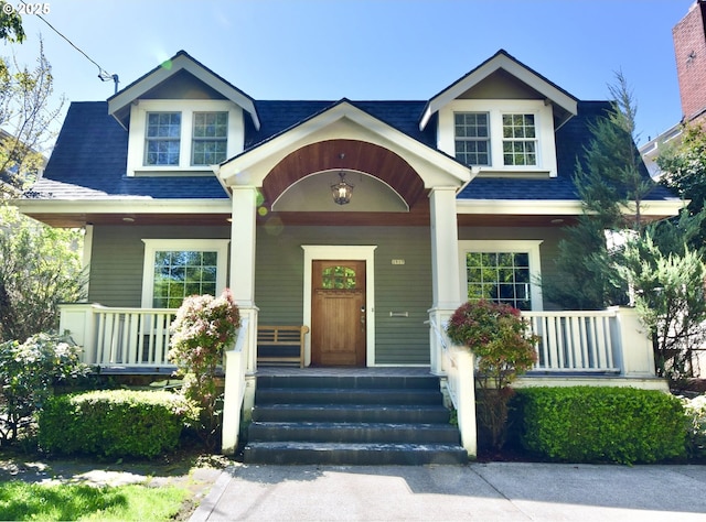 2917 NE 9th Ave, Portland, OR 97212 - view of front of property featuring covered porch and roof with shingles