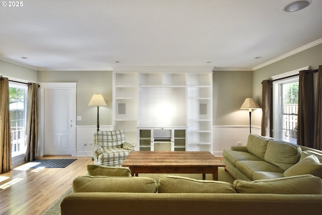 2917 NE 9th Ave, Portland, OR 97212 - living area with healthy amount of natural light, wood finished floors, and crown molding