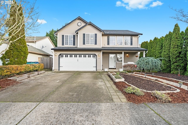 front of property with a porch and a garage