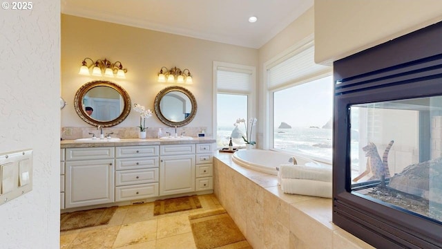 96424 Shorewood Ter, Brookings, OR 97415 - bathroom featuring a garden tub, a sink, and double vanity