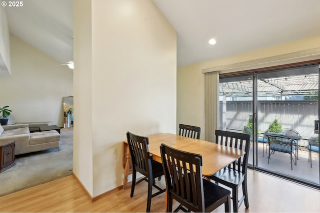 12604 NE Prescott Dr, Portland, OR 97230 - dining space featuring ceiling fan, light wood-style flooring, high vaulted ceiling, and baseboards