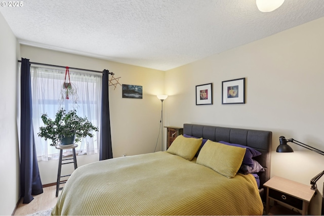12604 NE Prescott Dr, Portland, OR 97230 - bedroom featuring a textured ceiling
