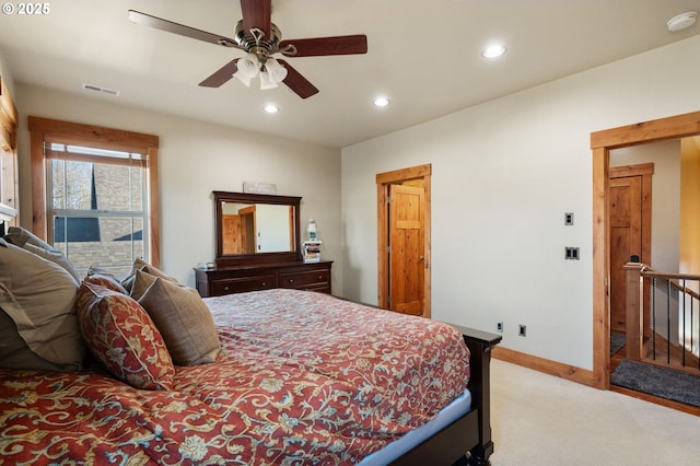 bedroom with light carpet, baseboards, visible vents, and recessed lighting