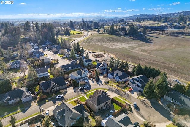 aerial view featuring a residential view and a mountain view