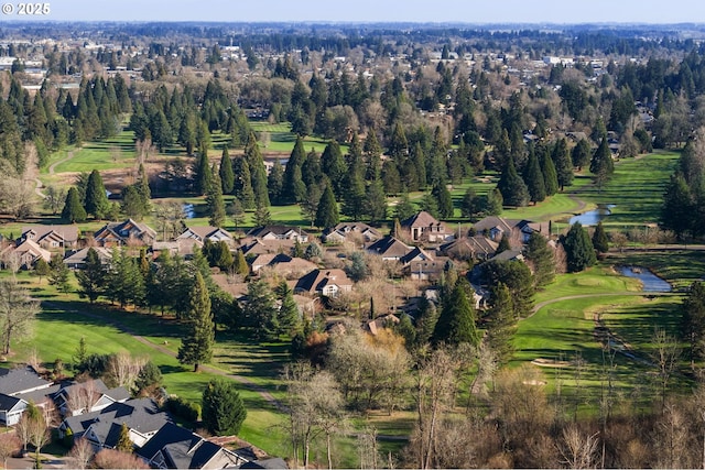 aerial view with view of golf course and a residential view