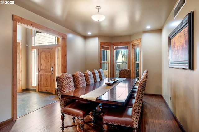 dining area featuring recessed lighting, baseboards, visible vents, and hardwood / wood-style floors