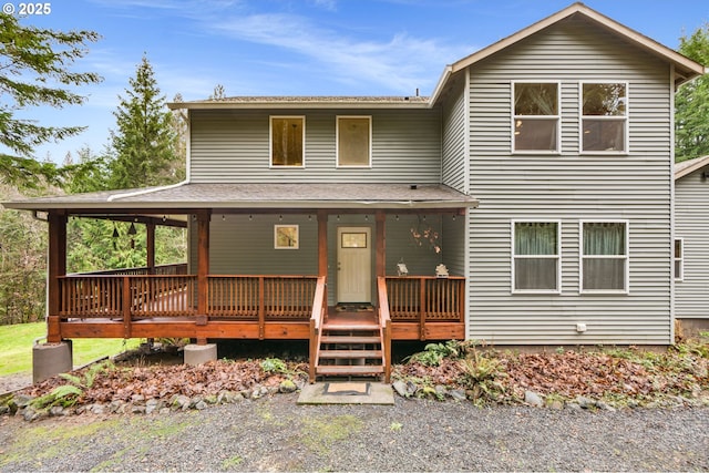 view of front facade featuring a wooden deck