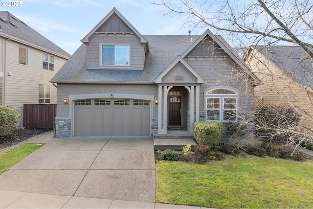 craftsman-style house with a garage and a front yard