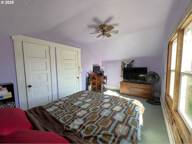 bedroom featuring ceiling fan and vaulted ceiling