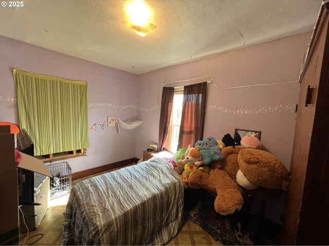 bedroom with a textured ceiling