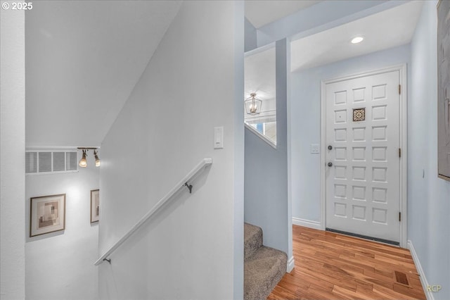 entrance foyer with light hardwood / wood-style flooring