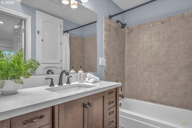 bathroom featuring shower / tub combo with curtain and vanity