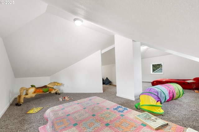 bedroom with lofted ceiling and carpet floors