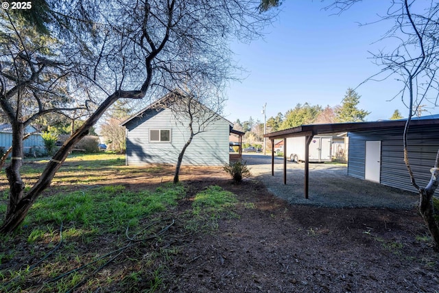 view of yard featuring a carport