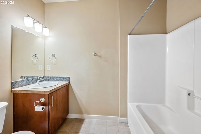 full bathroom featuring tile patterned flooring, vanity, shower / bathtub combination, and toilet