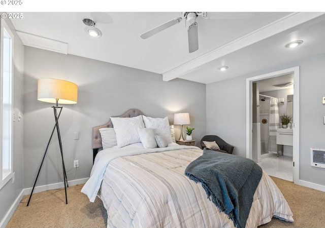 7720 SW Macadam Ave Unit 9, Portland, OR 97219 - bedroom with light colored carpet, heating unit, connected bathroom, baseboards, and a ceiling fan