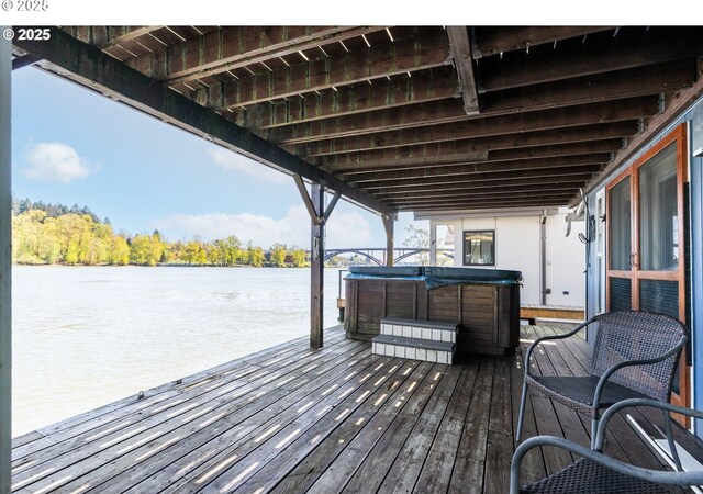 7720 SW Macadam Ave Unit 9, Portland, OR 97219 - dock with a hot tub and a deck with water view