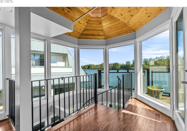 7720 SW Macadam Ave Unit 9, Portland, OR 97219 - unfurnished sunroom featuring a water view