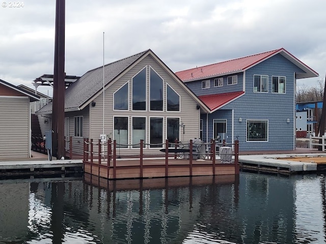 18699 NE Marine Dr Unit C-7, Gresham, OR 97230 - rear view of house featuring a water view and metal roof