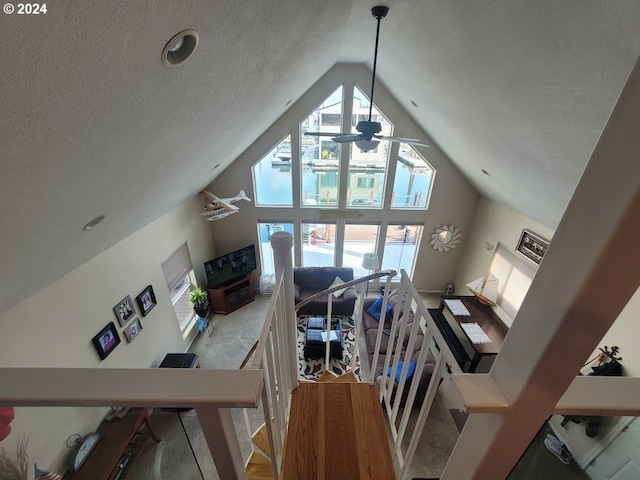 18699 NE Marine Dr Unit C-7, Gresham, OR 97230 - living area with a textured ceiling and high vaulted ceiling