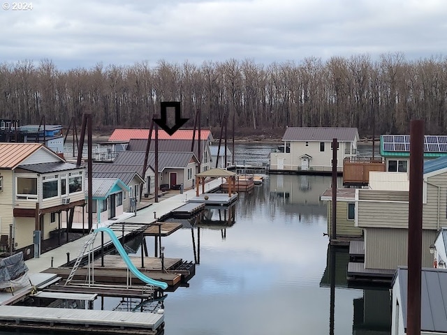 18699 NE Marine Dr Unit C-7, Gresham, OR 97230 - dock with a water view, boat lift, and a forest view